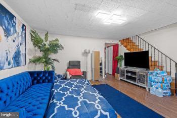 bedroom featuring hardwood / wood-style flooring