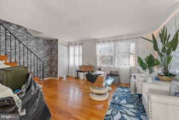 living room with hardwood / wood-style flooring