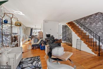 living room with hardwood / wood-style floors