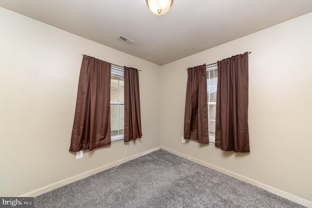 view of carpeted spare room