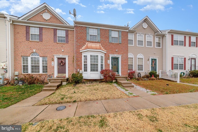 view of property with a front yard