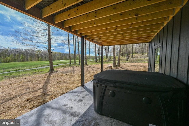 view of patio featuring a hot tub