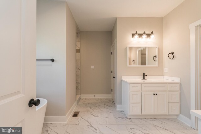 bathroom with a bathing tub and vanity