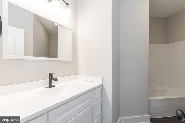 bathroom with vanity and tub / shower combination