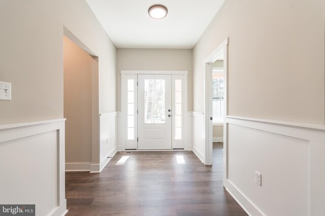 entryway featuring dark wood-type flooring