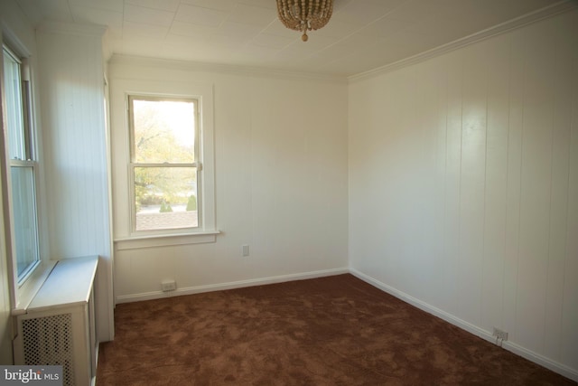 carpeted empty room with crown molding