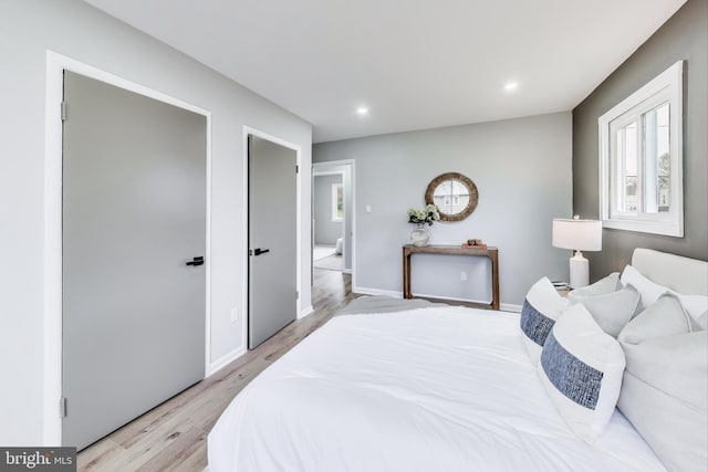 bedroom featuring light hardwood / wood-style floors