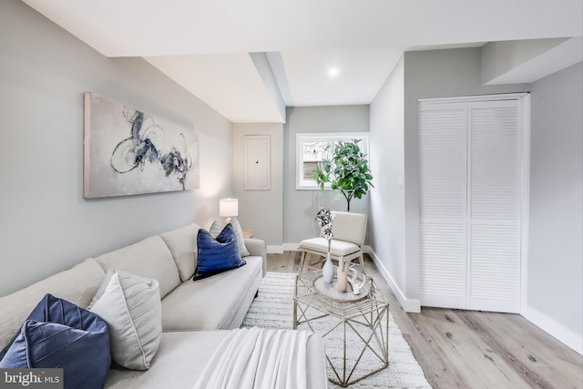 living room with light hardwood / wood-style floors