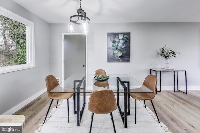 dining room featuring light hardwood / wood-style flooring