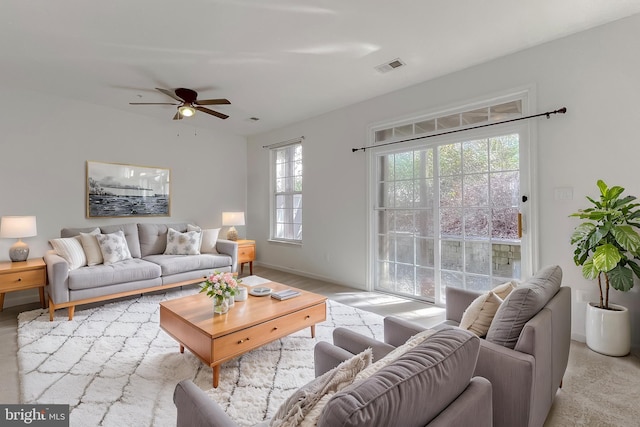 living room featuring ceiling fan