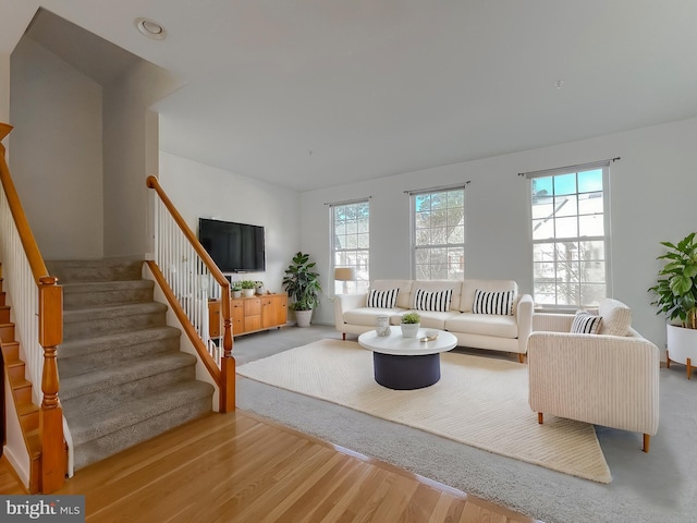 living room with light hardwood / wood-style flooring