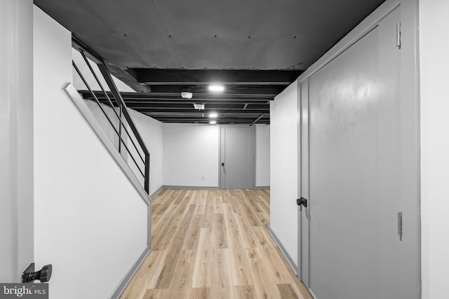 basement with light wood-type flooring