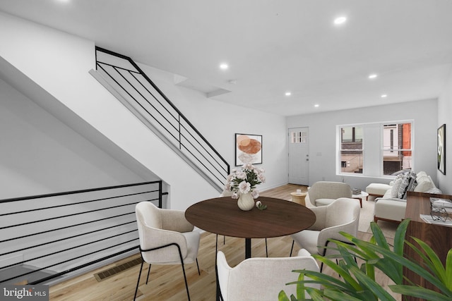 dining room with light hardwood / wood-style floors