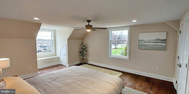 bedroom featuring hardwood / wood-style flooring, ceiling fan, and vaulted ceiling