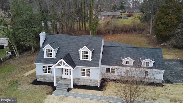 view of new england style home