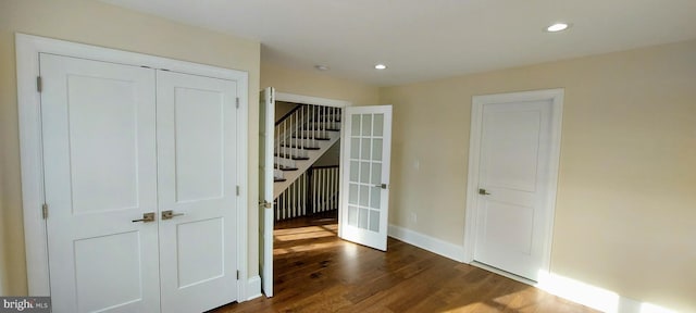 interior space with dark hardwood / wood-style floors