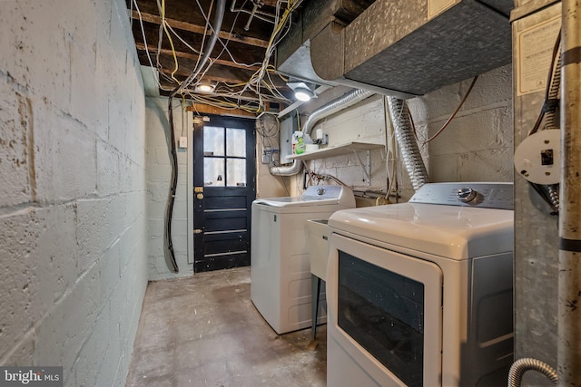 laundry room with washer and dryer