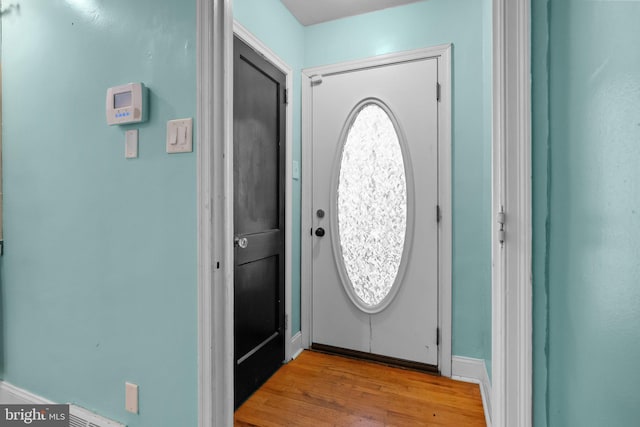 entryway with light hardwood / wood-style flooring