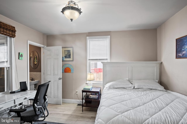 bedroom featuring light hardwood / wood-style flooring