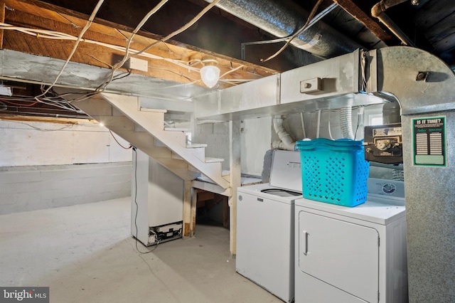 basement with washing machine and dryer