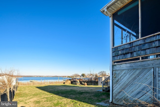 view of yard with a water view