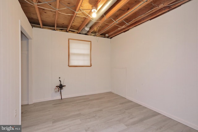 basement with light wood-type flooring