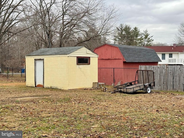 view of outdoor structure with a lawn