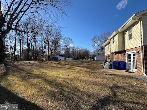 view of yard with french doors