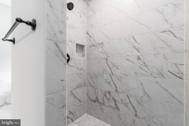 details featuring a tile shower