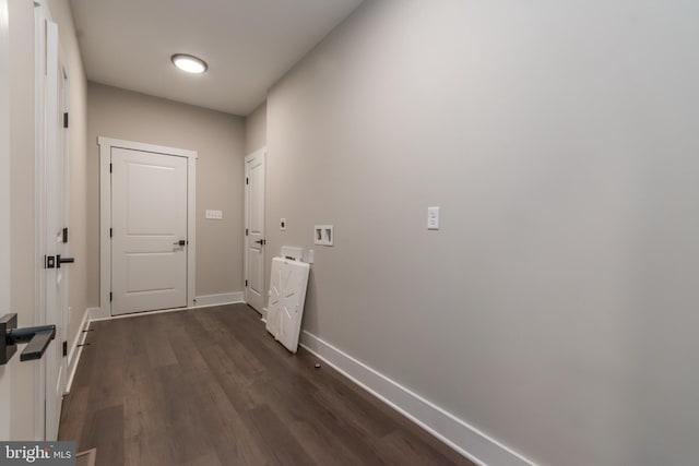 corridor with dark hardwood / wood-style floors