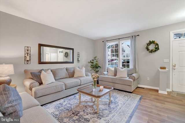 living room featuring light wood-type flooring