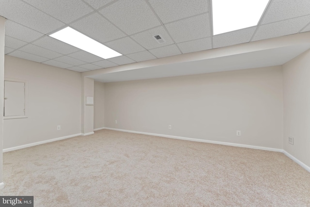 basement with light colored carpet