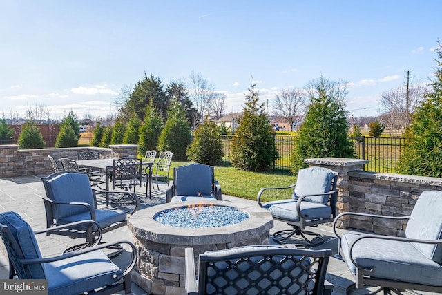 view of patio featuring an outdoor fire pit