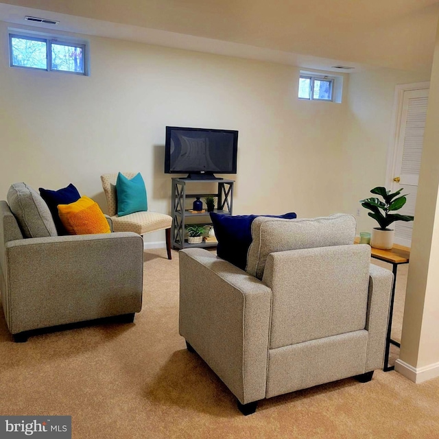 living room with light colored carpet