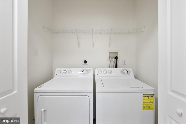 laundry room with independent washer and dryer