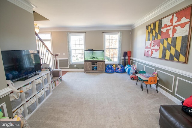 game room with carpet flooring and ornamental molding