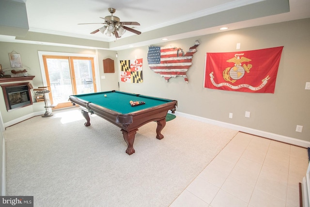 recreation room featuring a tray ceiling, ceiling fan, ornamental molding, and billiards