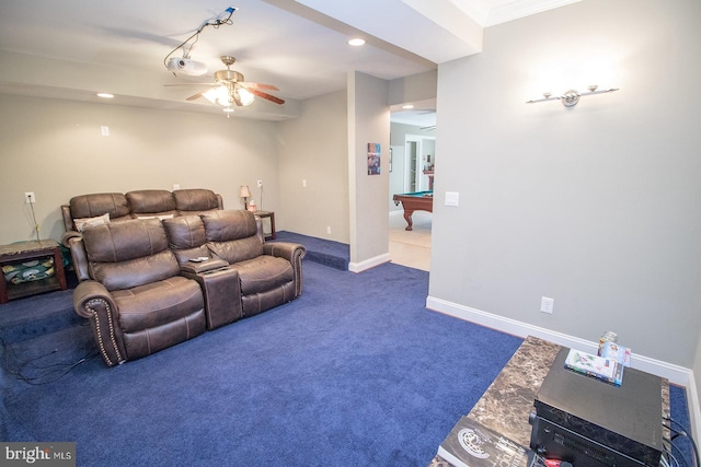 living room featuring ceiling fan, dark colored carpet, ornamental molding, and pool table