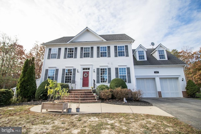 colonial-style house with a garage