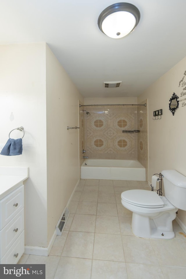 full bathroom featuring tile patterned floors, vanity, toilet, and tiled shower / bath