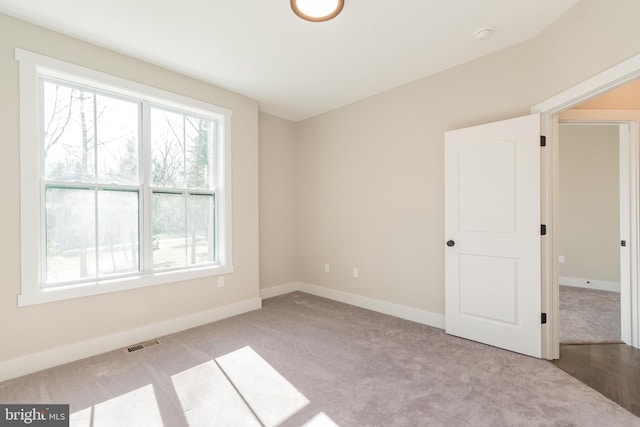 view of carpeted spare room