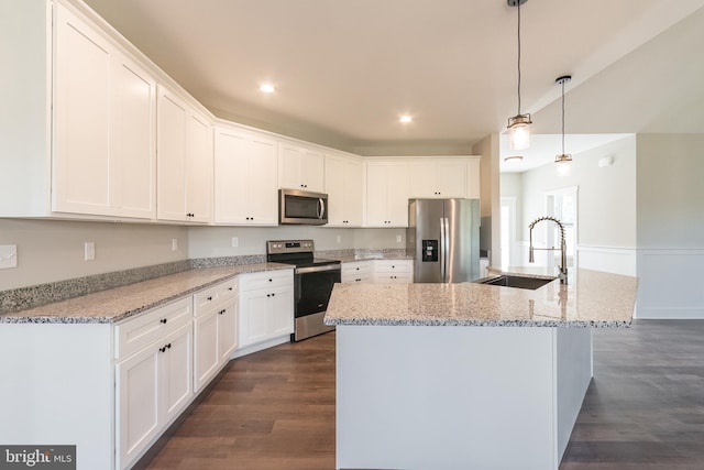 kitchen featuring white cabinets, sink, and stainless steel appliances