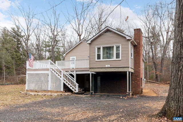 view of front of house featuring a deck