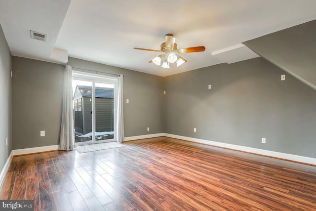 unfurnished room with hardwood / wood-style flooring and ceiling fan