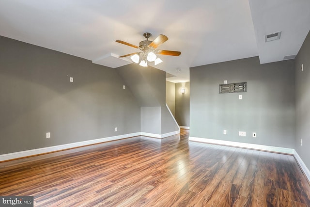 empty room featuring wood-type flooring and ceiling fan