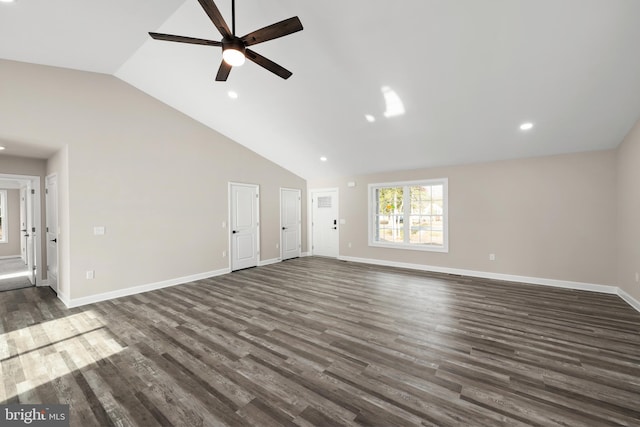 unfurnished living room with ceiling fan, dark hardwood / wood-style flooring, and high vaulted ceiling