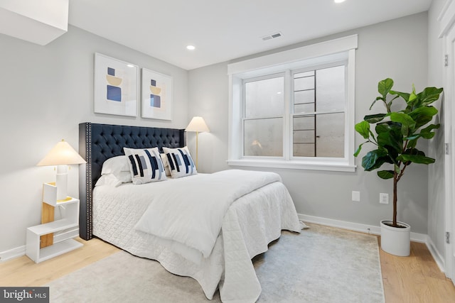 bedroom featuring hardwood / wood-style floors