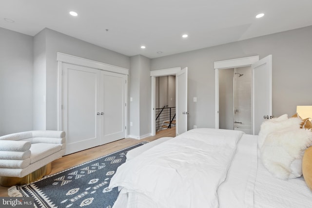 bedroom featuring a closet and hardwood / wood-style floors