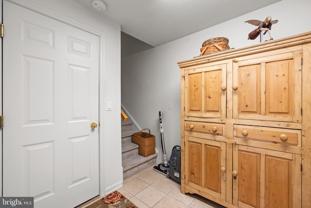 interior space featuring light tile patterned flooring