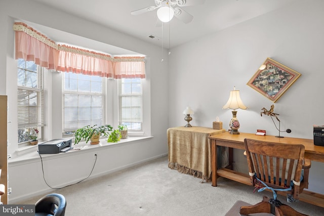 office area featuring light colored carpet and ceiling fan